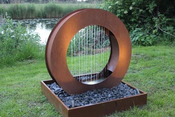 SCULTURA A FONTANA IN ACCIAIO CORTEN